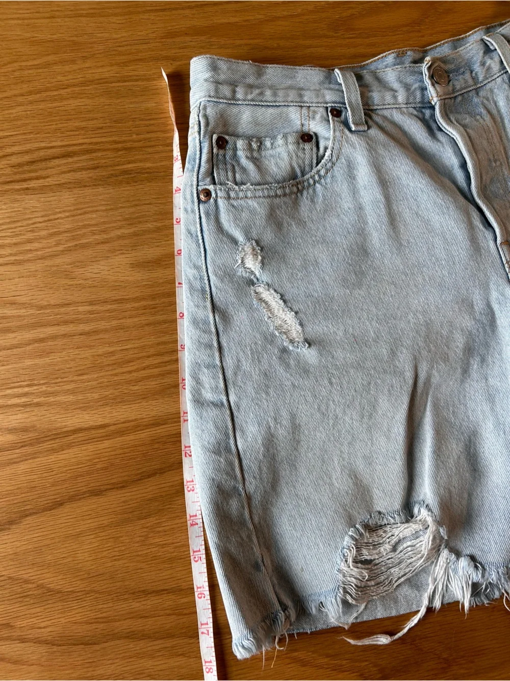 Levi's distressed light wash long denim button fly jean shorts size 28